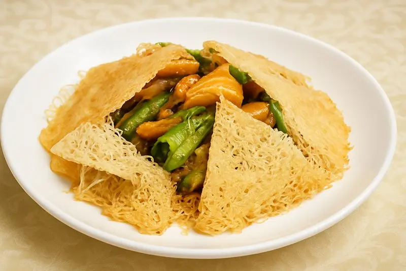 Bitter melon and fish with fried rice noodles